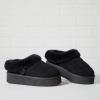 Dearfoams womens Genuine Shearling Platform Slippers Bendigo Comfy Puff Plush Womens Clog House Shoes(Black)