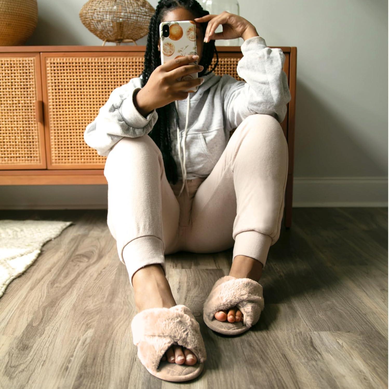 imageDearfoams Womens Acquired Style amp Danielle Pheloung Exclusive Memory Foam Jessica Cozy Bow Cross Band Slide SlippersLatte